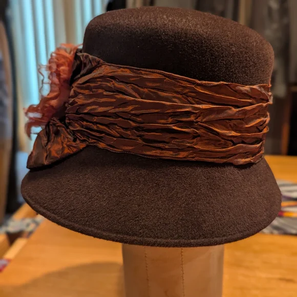 Elegant Brown Hat with Floral Accent